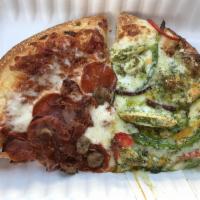 Creamy Pesto Chicken Pizza · Roasted chicken with a creamy light pesto sauce, red onions, green and red bell peppers and ...