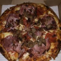 Grizzly Pizza · Pepperoni, salami, smoked ham, Italian sausage and bacon.