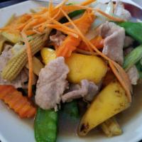 Mango Madness · Fresh mangos stir-fried with ginger, baby corn, snow peas, bell peppers and green onions in ...