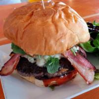The Blue Dream Burger · 8 Oz. Signature Beef Patty, Gorgonzola, House Bourbon BBQ, Onions Rings, Thick Applewood Smo...