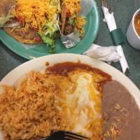 Bulverde Plate · 2 cheese enchiladas topped with tex mex sauce melted with cheese, a bean and cheese chalupa ...