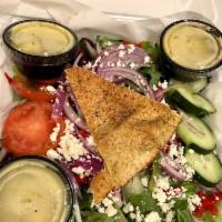 Greek Salad · Fresh mixed lettuces, tomatoes, cucumbers, roasted red peppers,
red onions, feta, pepperonci...
