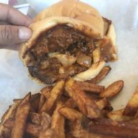 Primo's Chili Cheddar Burger · 6 oz. beef patty, homemade chili, grilled onions and cheddar cheese.