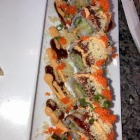Red Dragon Roll · Shrimp tempura, cucumber, topped w/ spicy tuna, crunch, masago, scallion, eel sauce and spic...
