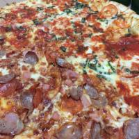 Meat Lovers Pizza · Italian sausage, ham, bacon, pepperoni, mozzarella cheese and pizza sauce.