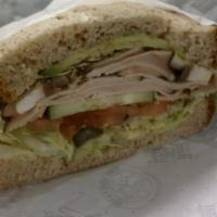Turkey Avocado Sandwich · Turkey breast, avocado and sprouts on your choice of bread and toppings.