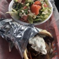 Gyros Sandwich · Sliced thin seasoned beef and lamb mix on a rotisserie. Served with fresh lettuce, tomato, o...