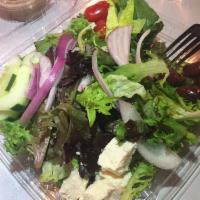 Greek Salad · Lettuce, tomato, onion, cucumber, feta cheese and olives. Served with a side of house dressi...