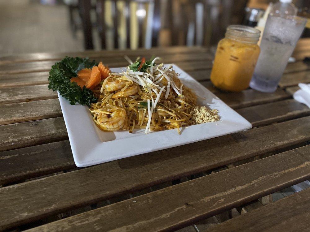 Pad Thai · Rice noodle, egg, spring onion, bean sprouts and ground peanut.