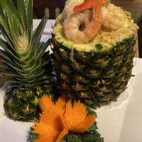 Pineapple Fried Rice · Thai fried rice with cumin flavor, pineapple, cashew nut with chicken and shrimp.