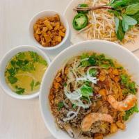 Hu Tieu Special · A traditional Vietnamese dish served either with or without broth. The dry option features a...