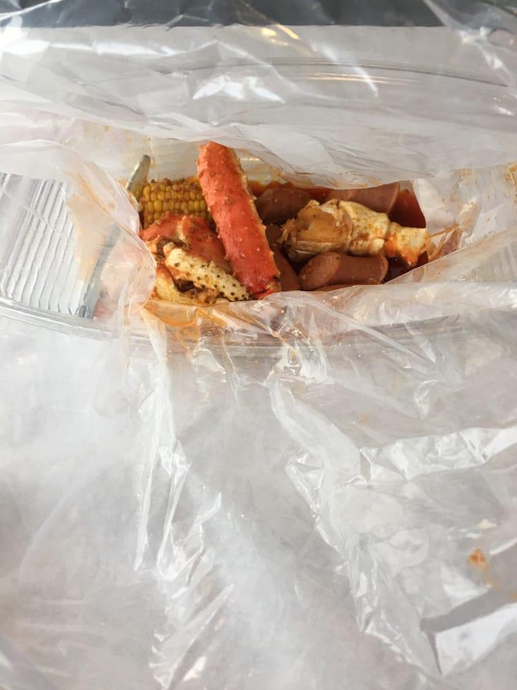 King Crab Legs · Price is per pound! Tossed in a bag with your choice of seasoning and spice level. Includes 1 corn