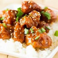 Sesame Chicken · Chunks of boneless chicken deep fried to golden brown then sauteed in sweet and sour, sesame...