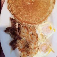 Pancake Plate · Enjoy 2 buttermilk pancakes with 2 eggs and your choice of bacon or sausage.