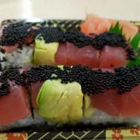 8 Piece Hungry Maki · Spicy salmon and mango, topped with tuna, avocado and tobiko.