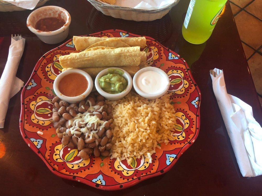 Taquitos · 3 cripsy Taquitos perfectly golden fried and served with rice and beans.