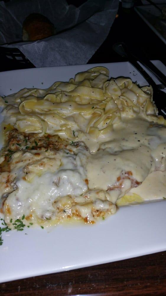 Tour of Italy · Choice of chicken or veal Parmigiana, with fettuccine, Alfredo and lasagna on 1 plate.