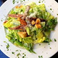 Caesar Salad · Whole leaf romaine, house made focaccia croutons and grana padano.
