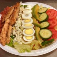 The Harmony Cobb Salad · Salad greens with grilled chicken breast, avocado, bacon, hard boiled egg, bleu cheese crumb...