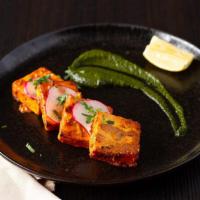 Achari Paneer Tikka · Indian cheese, house pickle flavor. Spicy. Vegetarian.