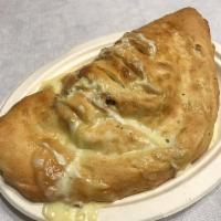Calzones · All of our calzones includes mozzarella and ricotta cheese. Served with marinara sauce. Wrap...