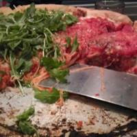 Prosciutto and Arugula Pizza · 