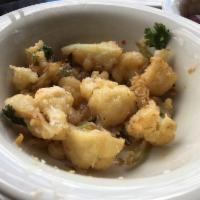 Crispy Cauliflower · Sweet chili, scallion, garlic. Vegan. gluten free available up on request