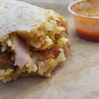 World Famous Classic Burrito · Bacon, ham, sausage, eggs, shredded cheddar jack cheese and hash browns.