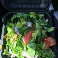 Fatoosh Salad · Lettuce, tomato, pita chips, onions, cucumber and peppers. Served with house dressing. Add f...