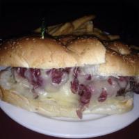 Paul Revere Sandwich · Hand cut Romanian pastrami, Corned beef, Swiss cheese, Bermuda onions and honey Dijon mustard.