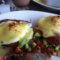 California Eggs Benedict · English muffin, turkey bacon, avocado, fresh sliced tomatoes and poached eggs topped with ho...