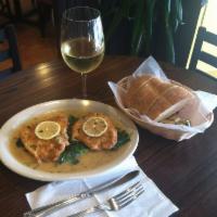 Chicken Francese · Egg-battered chicken breast sauteed in lemon, butter and white wine sauce.
