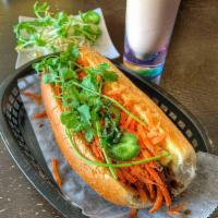 Vegetarian Banh Mi · Braised tofu. Choice of fresh roll with house mayonnaise, pickled vegetables, cucumber, cila...