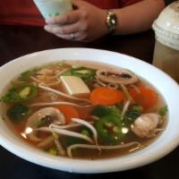 Vegetarian Pho · Assorted vegetables, tofu, and mushrooms in an aromatic vegetable broth. Rice noodles with o...