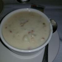 New England Clam Chowder · Celery, potatoes, bacon, and cream.