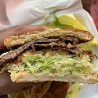 Torta · Comes with mayonnaise, lettuce, jalapenos, onions, avocado, and tomato.