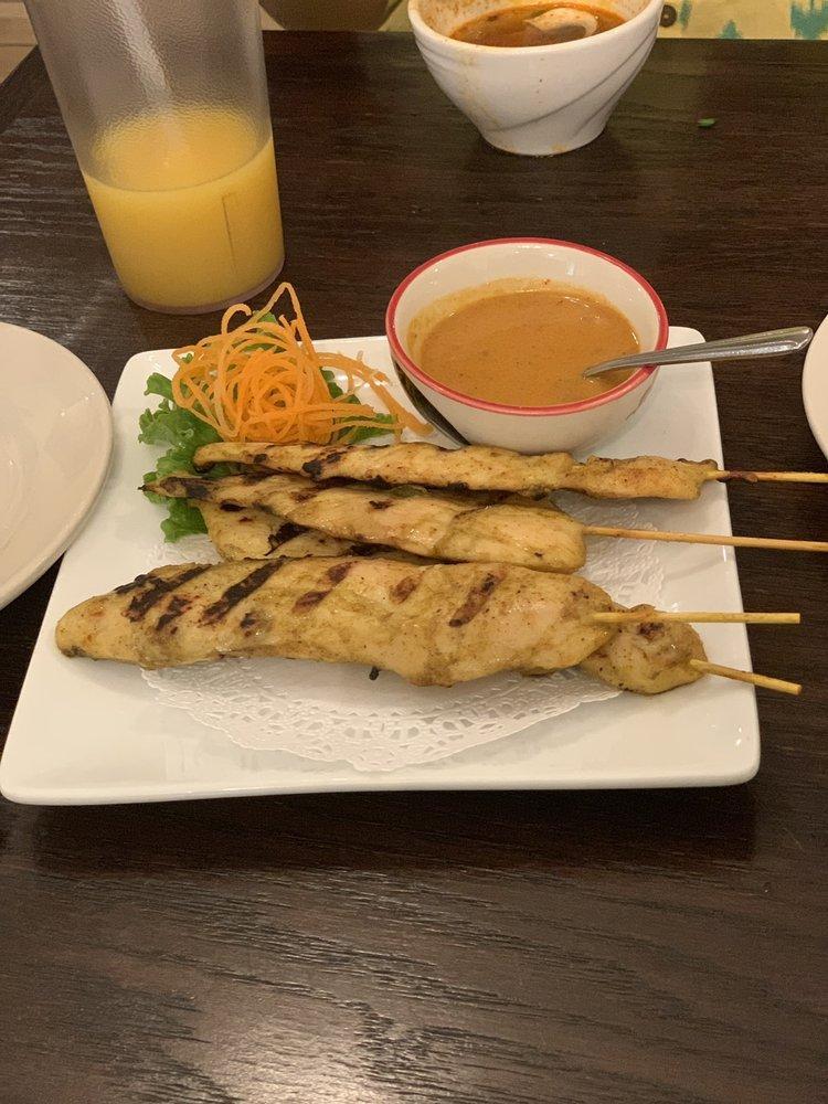 Chicken Satay · Chicken marinated in herbs, spices and coconut milk, grilled on skewers. Served with peanut sauce.