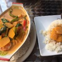 Red Curry · Bamboo shoots, eggplant, green beans, bell peppers and basil. Served with jasmine rice.