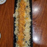 Crunchy Roll · 8 pieces. Shrimp tempura and asparagus inside; crunchy tempura flakes outside. Topped with e...