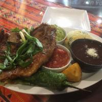 Carne Asada · Grilled flat meat select. All with rice, black beans, potato edge, guacamole and Guatemalan ...