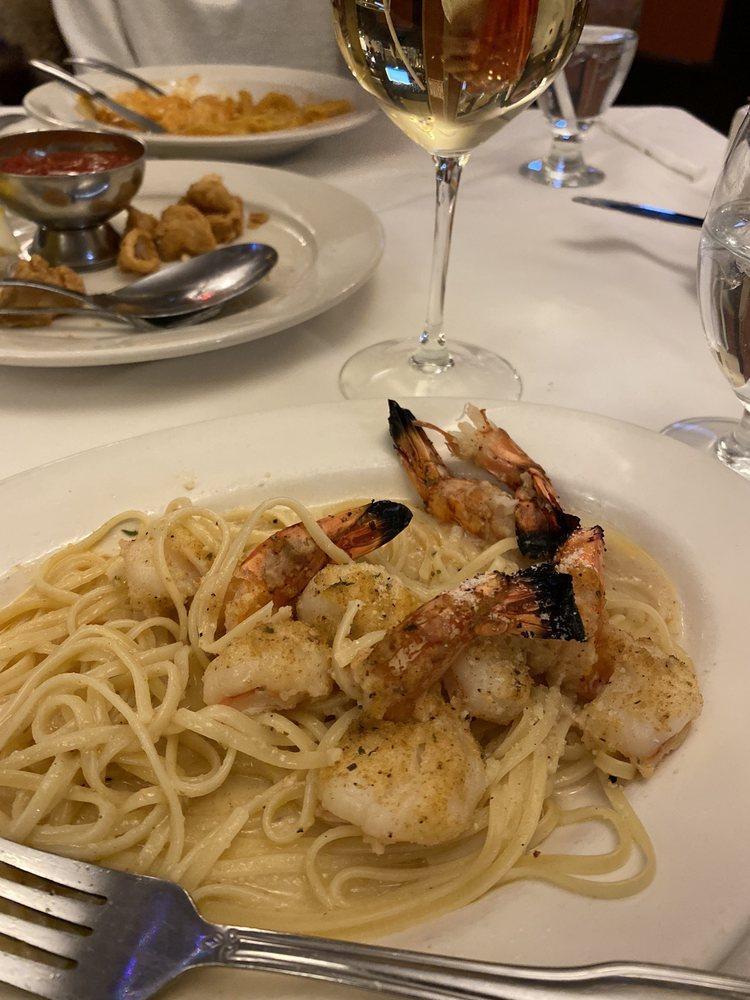 Shrimp Scampi · Shrimp broiled in garlic, butter, wine and lemon sauce. Served with rice.