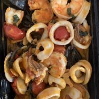 Spaghetti Neri · String cut black spaghetti, mussels, clams, shrimp, calamari, San Marzano tomatoes, and red ...