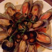 Mussels and Clams Oreganata · PEI mussels and little neck clams, pan sauteed in a white wine and garlic sauce, tossed with...