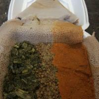 Gomen · With Ethiopian's bread (injera). Fresh chopped collard greens cooked with onion and garlic (...