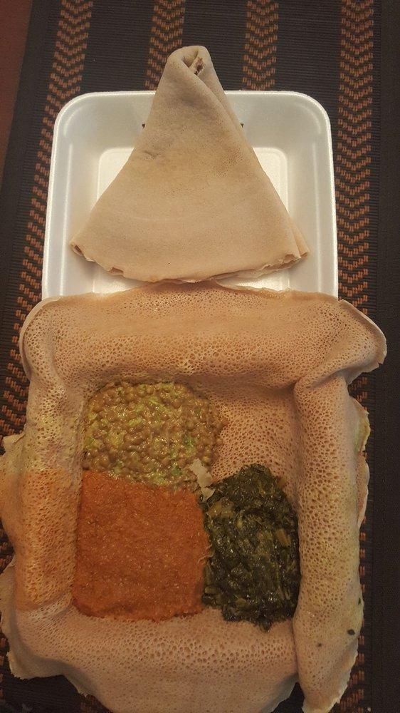 Green Lentil Salad · With Ethiopian's bread (injera). Green lentils cooked and mixed with minced onion and jalapeno in dressing.