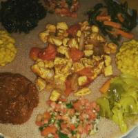 String Beans and Carrots · With Ethiopian's bread (injera). Sauteed string beans and carrots.