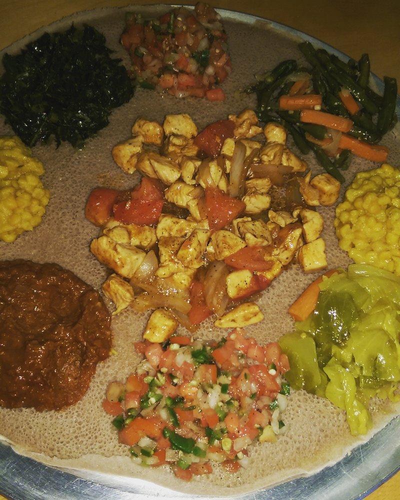 String Beans and Carrots · With Ethiopian's bread (injera). Sauteed string beans and carrots.