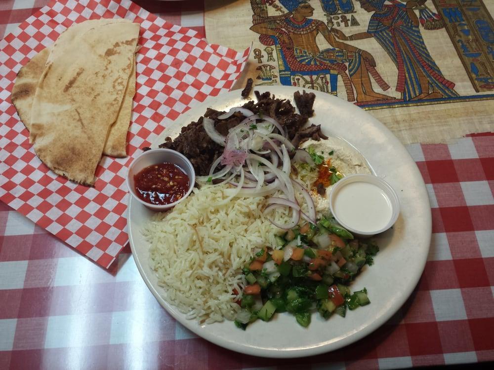 Hummus Topped with Beef Shawarma · 