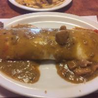Super Burrito · Your choice of asada, carnitas or pollo asado. Super sized tortilla, filled with rice, beans...