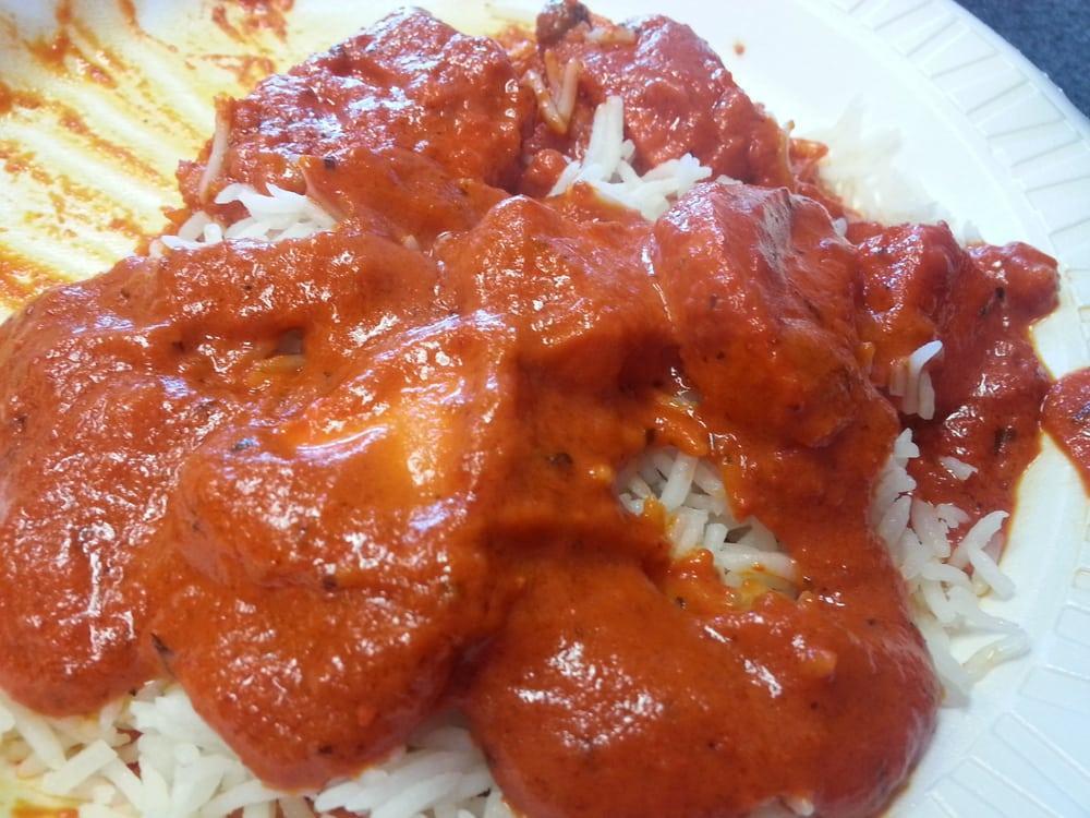 Chicken Tikka Masala · Boneless pieces of tandoori chicken smothered in rich onions and tomato gravy, flavored with fenugreek leaves.